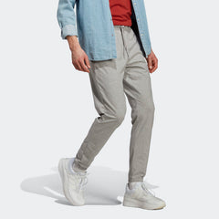 Men's adidas Essentials Single Jersey Tapered Badge of Sport Pants